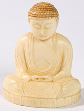 ORIENTAL CARVED IVORY SEATED BUDDHA
