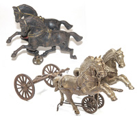 TWO CAST IRON DOUBLE HORSE TEAMS