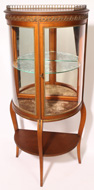FRENCH STYLE CURVED GLASS CURIO CABINET