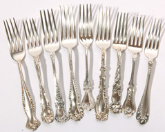 9 PIECES OF STERLING SILVER FORKS